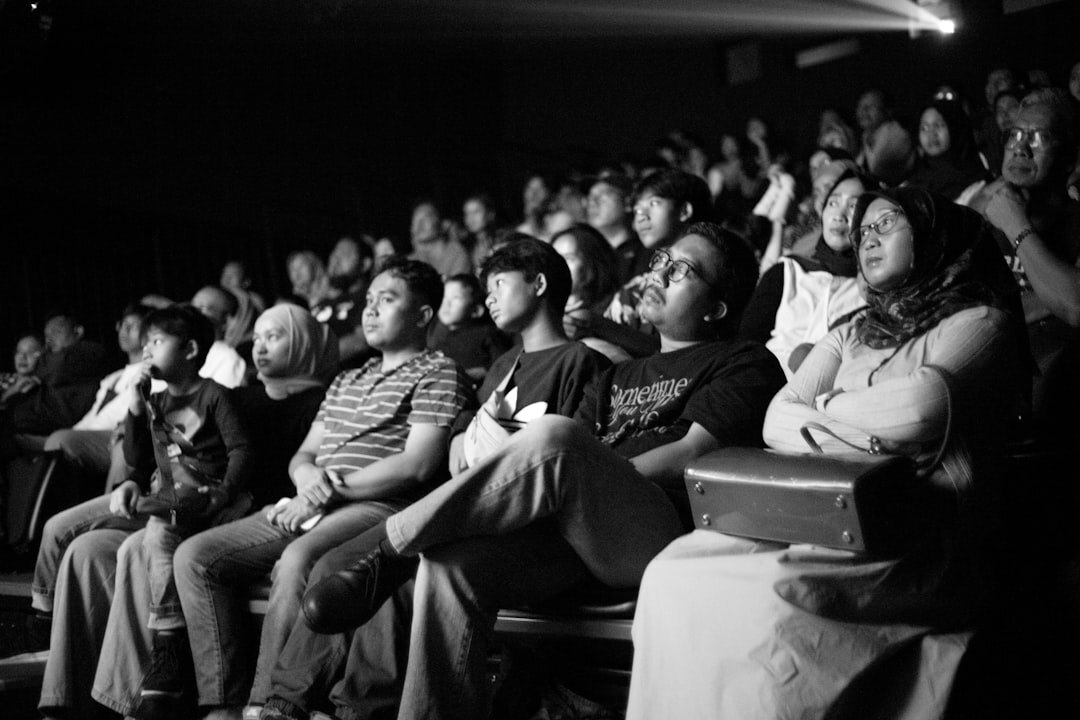 audience watching movie in theater