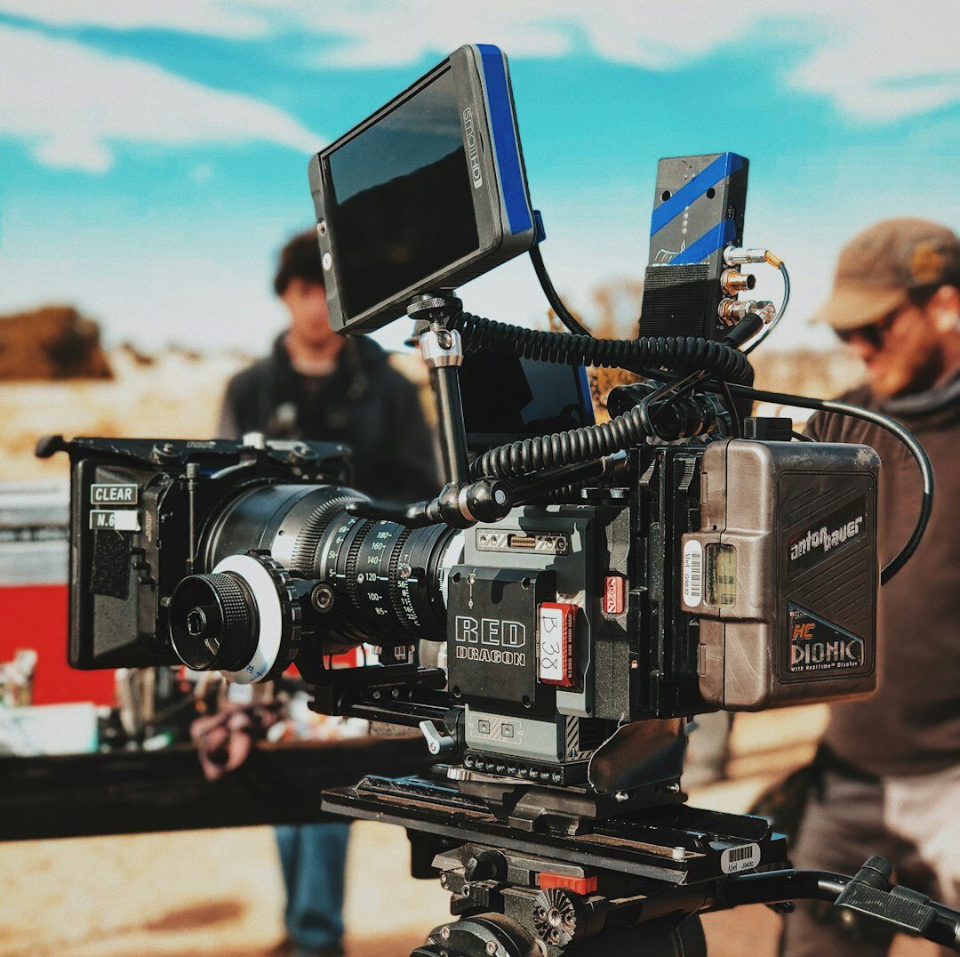 filmmaker holding camera on set